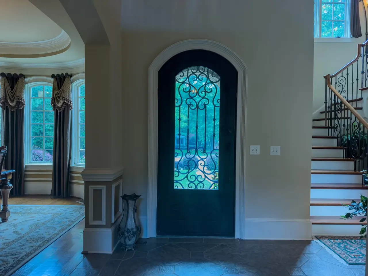 Foyer and iron front door from inside